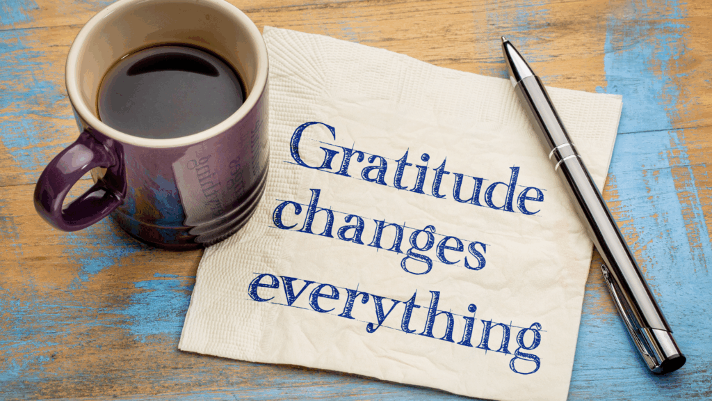 Coffee mug next to a napkin that says Gratitude changes everything, highlighting how thanking Believe in Me grantees fuels youth empowerment.