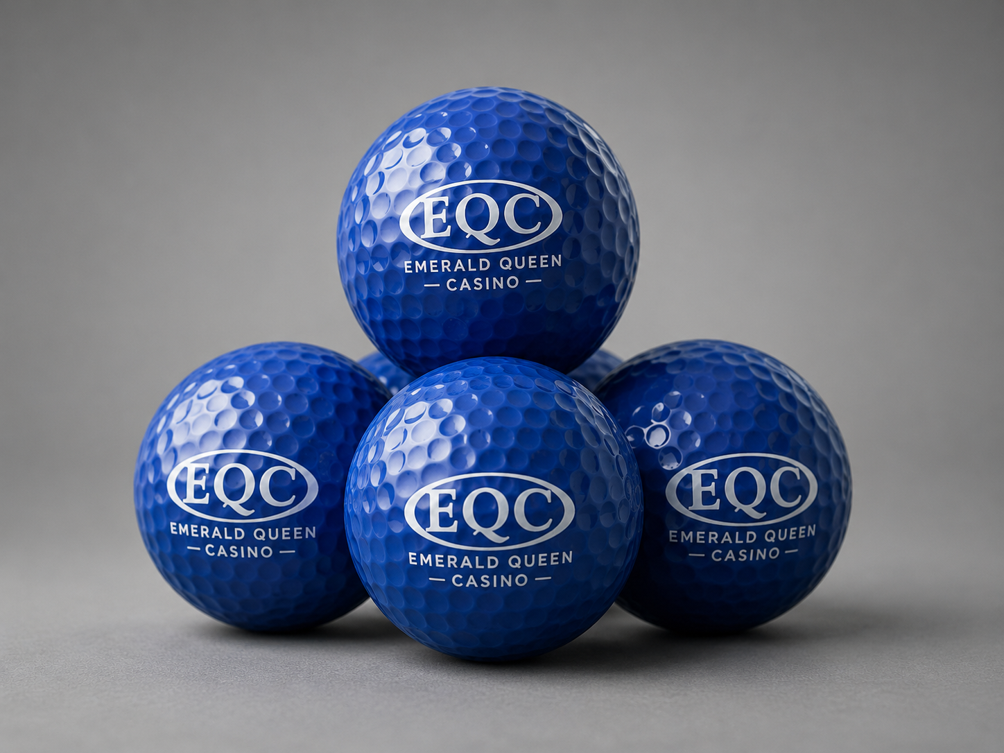 Golf balls representing a useful branded tournament donation