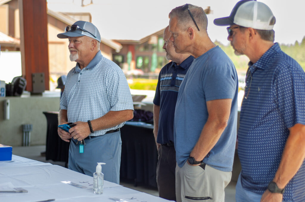 Golfers gathering during a past Believe in Me charity golf event at Circling Raven