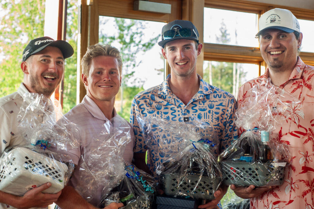 Four golfers posing with awards in the Believe in Me June 2025 Circling Raven photo archive